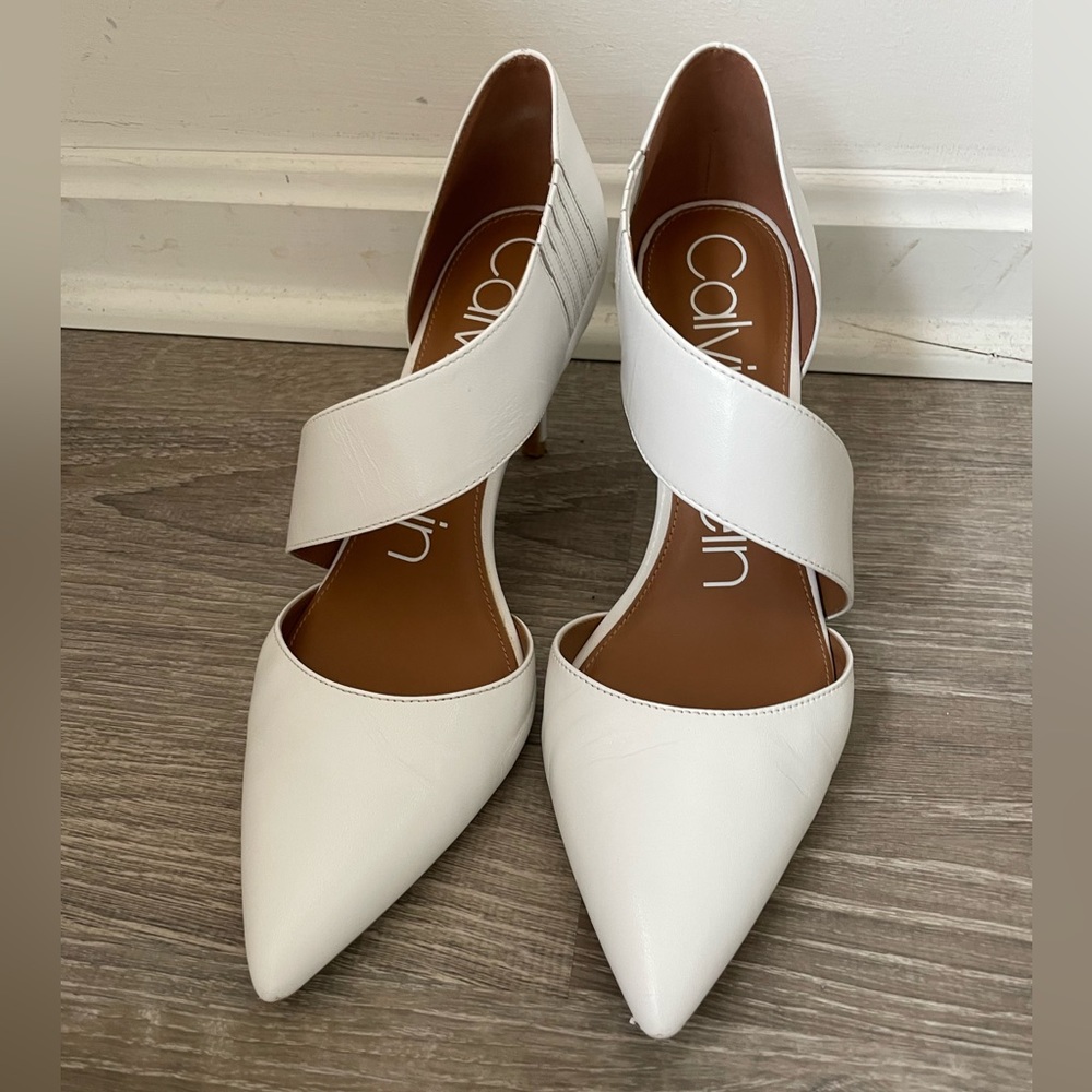 Calvin Klein white shoes.